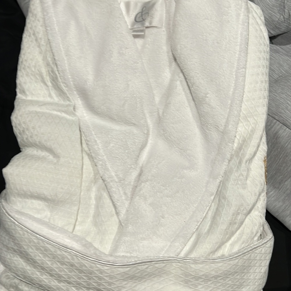Brand new robes. His/hers. Never worn. Trump logo n front
